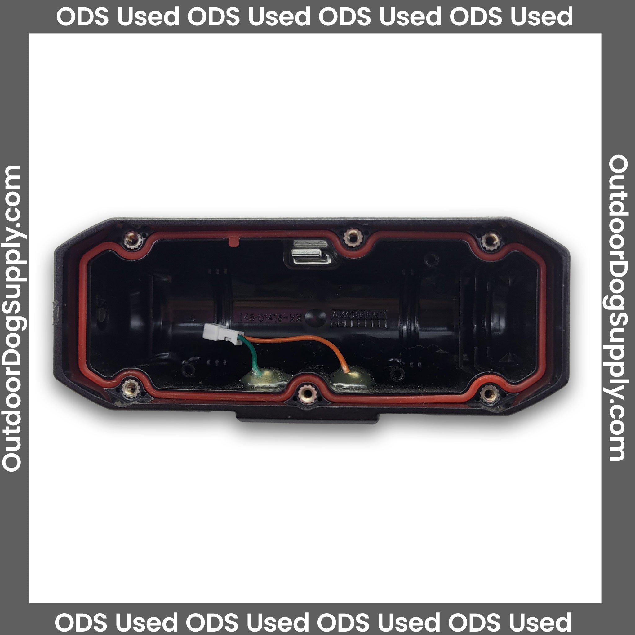 Top view of a gently used replacement Garmin DC40 dog tracking collar housing