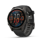 Garmin Fenix 8 43 MM Sapphire Carbon Gra DLC Titanium with Black Pebble Gray Silicone Band front facing showing menu and time