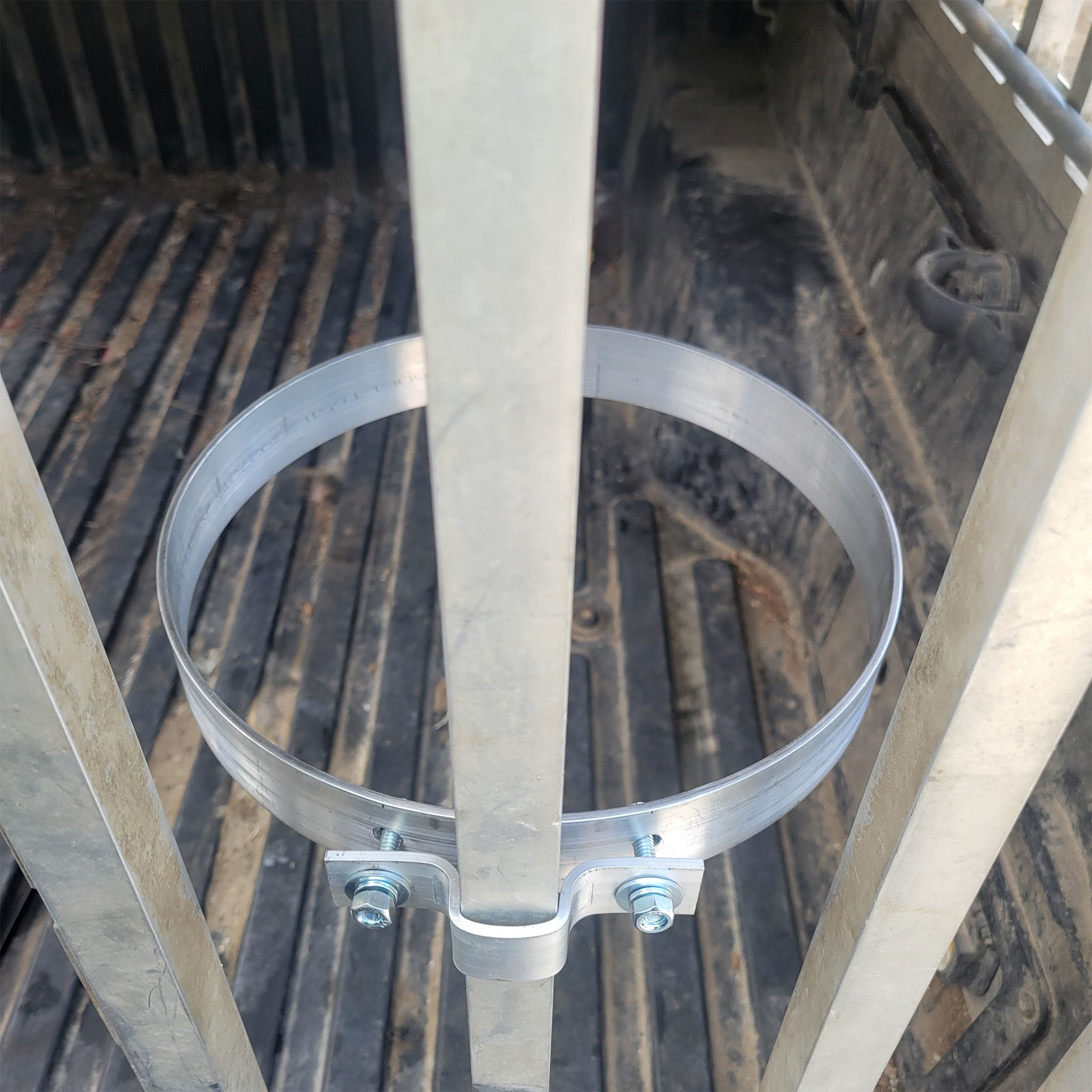 Outside view of a metal bucket holder on a dog box