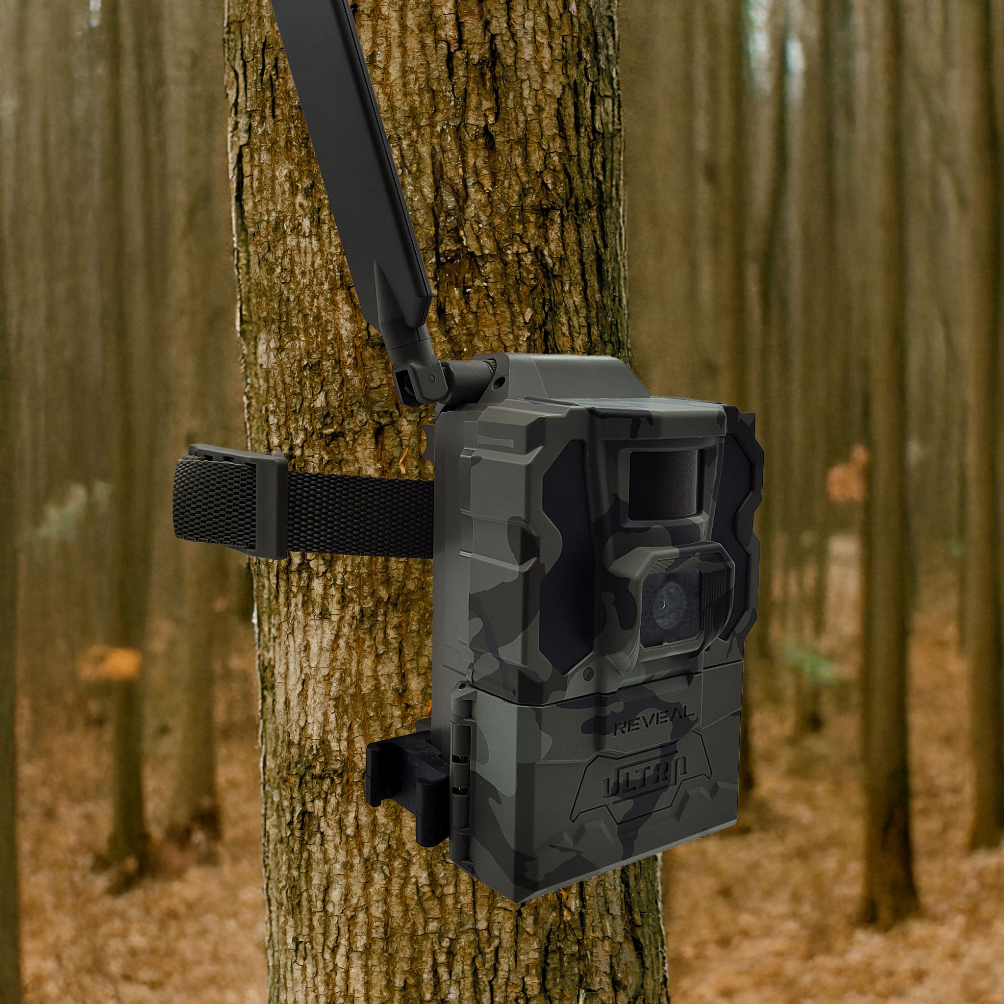 Camo Tactacam REVEAL X Ultra 3.0 Cellular Trail & Game Camera With Built In Live Streaming strapped on tree